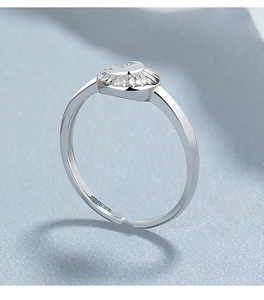 Macro shot of 925 sterling silver adjustable ring with heart-shaped moon and zircon