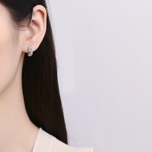 925 sterling silver hoop earrings with multicolored cubic zirconia on female model