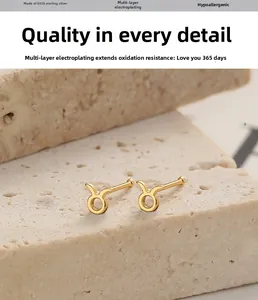 Détail de boucles d'oreilles Taureau dorées en argent sterling S925 de haute qualité