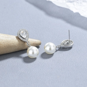 Elegant S925 silver teardrop pearl earrings with micro-pave white zircon crystals