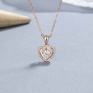 Collana a cuore in argento 925 oro rosa con pendente in zircone danzante e alone di diamanti