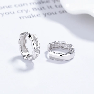 925 sterling silver hoop earrings with zircon pavé and unique wavy edge design