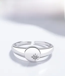 Detail of S925 sterling silver adjustable ring with central starburst zircon stone