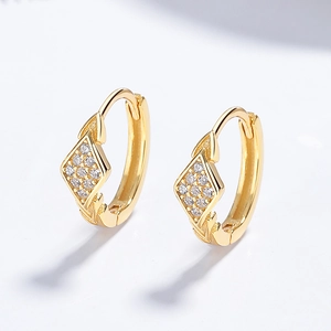 925 silver golden huggie earrings with diamond-encrusted rhombic pattern in macro view