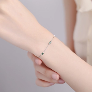 Elegant 925 sterling silver box chain bracelet with rectangular green emerald stones