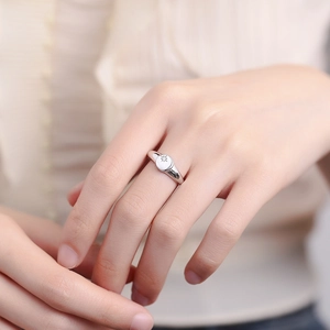 Elegant 925 sterling silver starburst open ring with small rhinestone on woman's hand