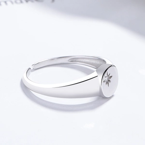 Minimalist 925 sterling silver open ring featuring an engraved starburst and zircon stone