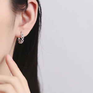 Boucles d'oreilles créoles en argent 925 avec symbole infini et oxydes de zirconium