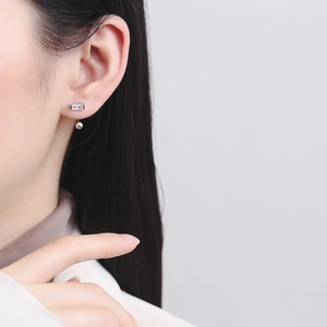 925 silver stud earrings with rectangular zircon and polished drop beads on model