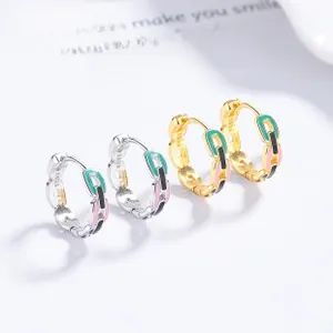 Close-up of S925 sterling silver chain earrings with colorful enamel and S925 engraving
