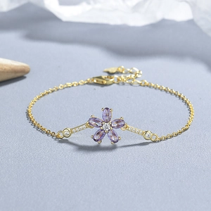 Bracciale in argento 925 con fiori in zircone viola e catena dorata da donna