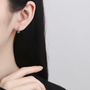 Elegant 925 sterling silver hoop earrings with hollow star and moon charms for women