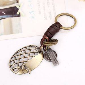 Vintage men's genuine leather keychain with antique bronze bird charm and engraved tags