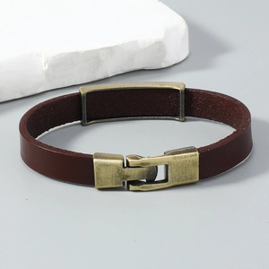 Retro brown leather bracelet with vintage bronze metal plate and secure clasp closure