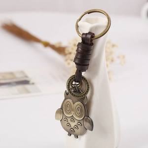 Vintage bronze owl pendant keychain with hand-woven leather strap for bags and keys