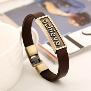 Retro dark brown leather bracelet with an antique brass plate engraved with achieve