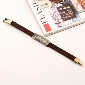 Vintage dark brown leather bracelet with an engraved bronze heart plate for men and women