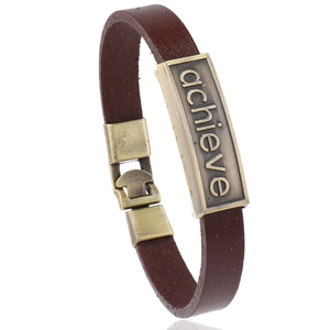 Bracciale vintage in pelle marrone con placca in bronzo antico e chiusura in metallo