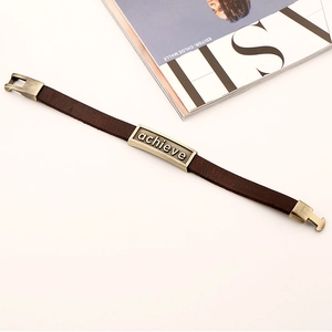 Retro deep brown leather bracelet featuring a bronze metal plate with achieve engraving