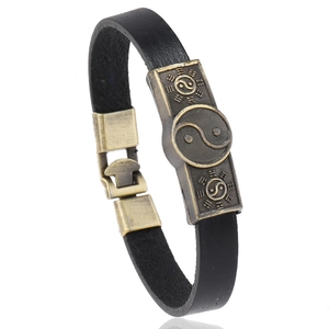 Retro black leather bracelet with bronze Tai Chi Yin Yang symbol and Bagua charms