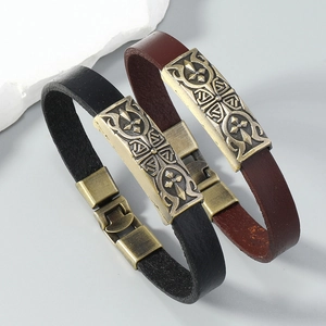 Vintage punk leather bracelet set in black and brown with embossed metal plates