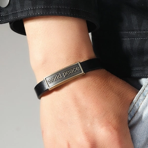 Vintage leather bracelet with world peace engraved metal plate for a retro men style