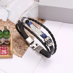 Vintage multilayer black leather bracelet with silver wing charm and blue accents