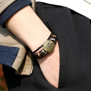 Aquarius zodiac woven leather bracelet for men featuring retro bronze charms and beads