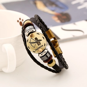 Vintage Sagittarius leather bracelet with braided cord and bronze zodiac pendant