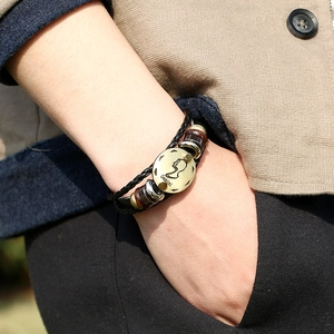 Men's multilayer Gemini leather bracelet with woven cords and bronze zodiac pendant
