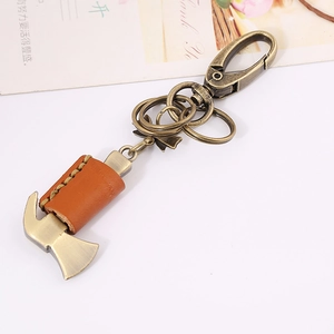 Vintage bronze hammer keychain with brown leather wrap and metallic swivel lobster clasp