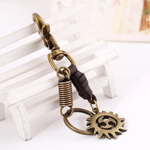 Retro vintage leather keychain with bronze sun wheel pendant for bags and keys