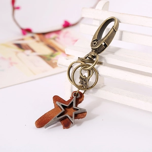 Vintage bronze star leather keychain for car keys and backpacks with rustic metal design