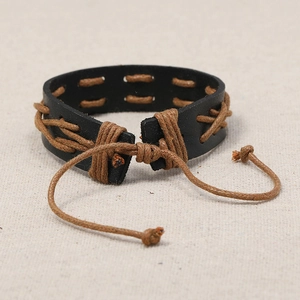 Bracelet en cuir de vachette fait main avec motif tressé en corde de chanvre marron