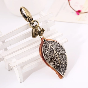 Vintage punk bronze leaf keychain with genuine leather lining and sturdy lobster clasp