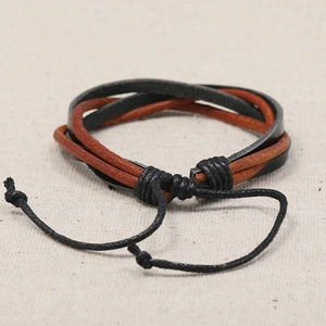 Retro handmade braided leather bracelet with adjustable black and brown straps for men