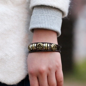 Vintage punk woven leather bracelet with bronze spade heart charm and metallic beads