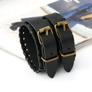 Vintage braided black leather wristband with bronze buckles in punk style