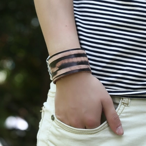 Men's wide layered leather bracelet with retro brown stripes and punk style aesthetics