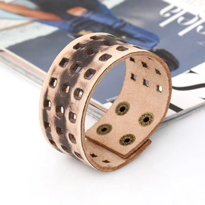 Vintage wide brown leather cuff bracelet for men with square cutouts and snap buttons