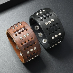 Retro punk wide leather bracelet set with silver studs and braided cord detailing