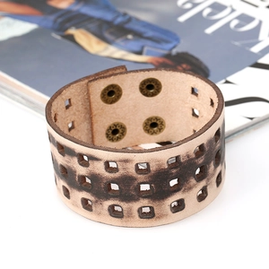 Vintage punk wide brown leather cuff bracelet with rustic metal snaps and cut-out details