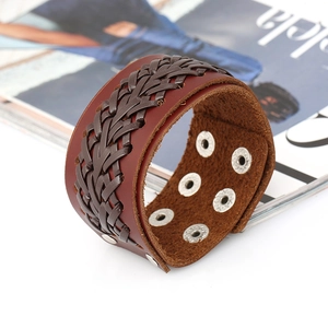 Retro wide brown braided leather bracelet for men featuring vintage metal grommet details