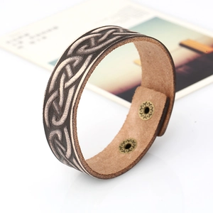 Vintage dark brown leather bracelet with celtic knot embossing and bronze snap buttons