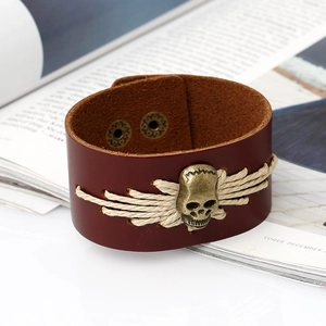 Bracelet vintage en cuir tressé marron foncé avec tête de mort en bronze et boucle