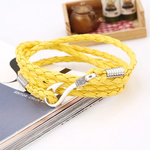 Detail of multi-layer yellow braided PU leather nautical bracelet with silver fish hook clasp