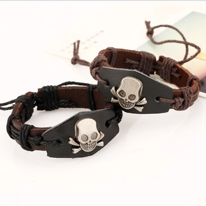 Adjustable woven leather bracelets with vintage alloy skull and crossbones emblems