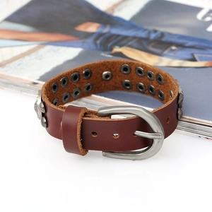 Vintage brown leather punk bracelet with lion head relief and adjustable metal buckle