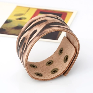 Vintage leather wristband with zebra pattern and antique copper eyelet buckles