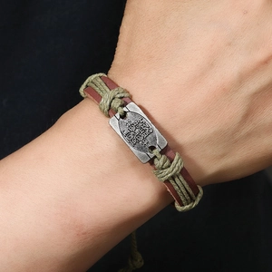 Handmade vintage braided leather bracelet for men with retro metal plate and rope detail